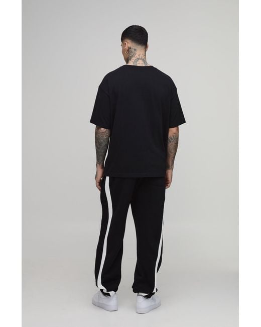 BoohooMAN Black Tall Baggy Fit Panelled Bungee Hem Jogger for men