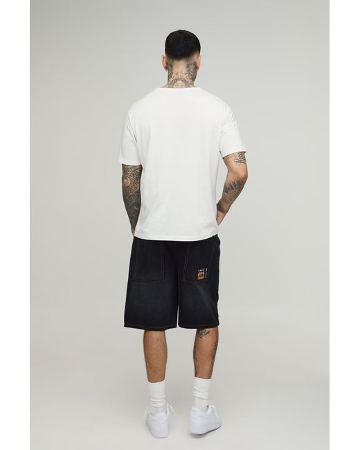 BoohooMAN Black Tall Relaxed Star Contrast Stitch Denim Shorts for men