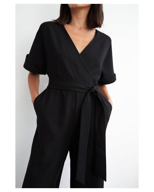 Warehouse Black Wrap Front Tie Waist Relaxed Jumpsuit
