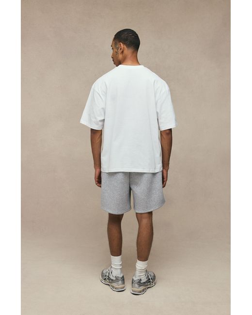 BoohooMAN Natural Oversized Script Hi-Lo T-Shirt And Baggy Short Set for men
