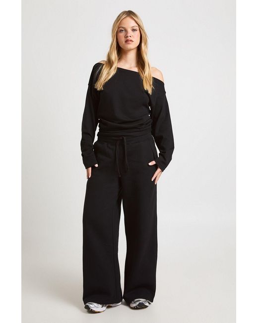 Boohoo Black Petite Cinched Waist Off Shoulder Straight Leg Tracksuit