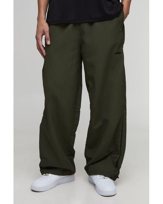 BoohooMAN Green Baggy Fit Contrast Gusset Nylon Trousers for men