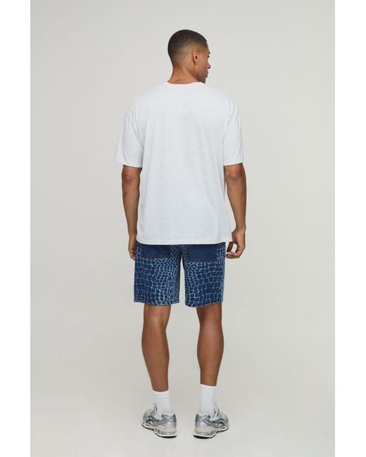 BoohooMAN Blue Relaxed Laser Printed Denim Shorts for men