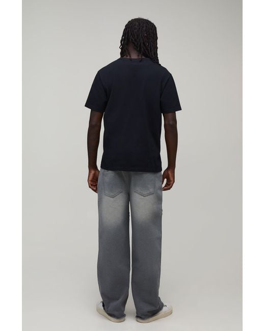 BoohooMAN Black Star Cut & Sew Relaxed Fit Jeans for men