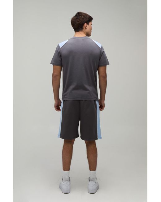 BoohooMAN Blue Contrast Piping Regular Fit T-Shirt & Baggy Short Set for men