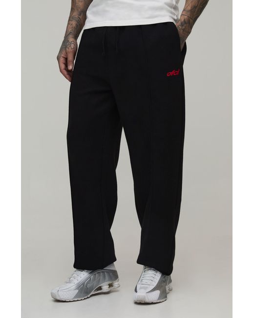BoohooMAN Black Tall Regular Fit Exposed Seam Embroidered Cuffed Jogger for men