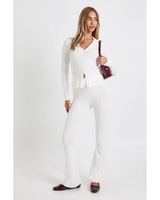 Boohoo White Seam Detail Button Through Knitted Top And Flare Trouser Set