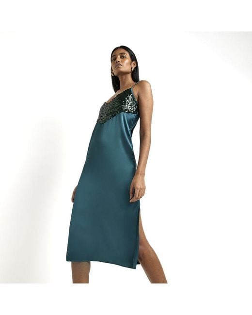 river island blue sequin dress princess polly baby blue dress River Island Cobalt Puff Sleeve Belted Midi Dress 18 Christmas in