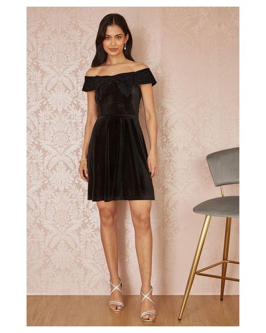 Mela London Black Velvet Skater Dress With Sparkle Bow Neckline