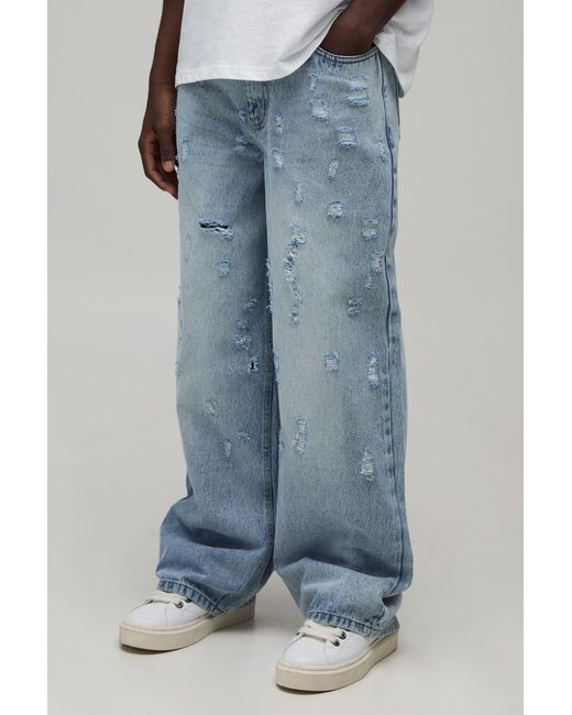 BoohooMAN Blue Fade Wash Extreme Distressed Baggy Fit Jeans for men