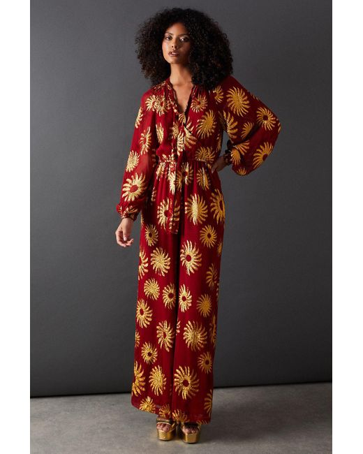 Warehouse Black Sun Metallic Jacquard Tie Neck Jumpsuit
