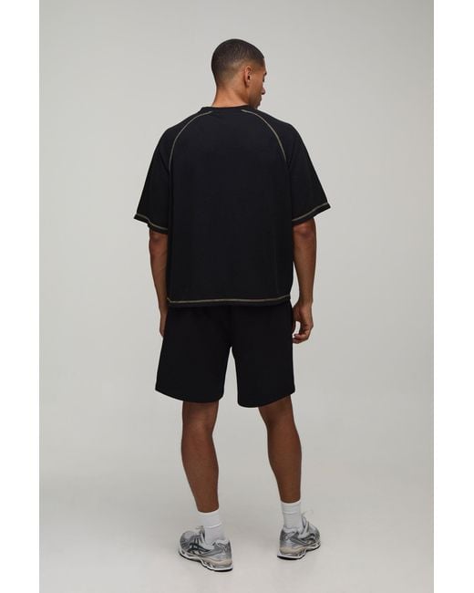 BoohooMAN Black Oversized Boxy Contrast Stitch Washed Raglan Waffle T-Shirt for men