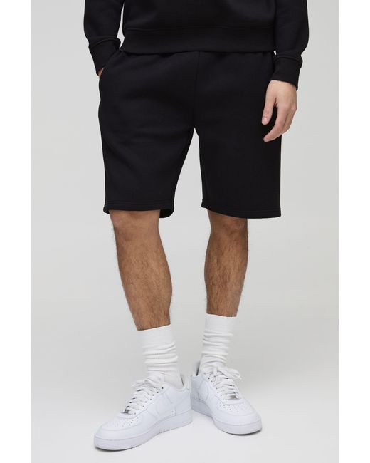 BoohooMAN Black Loose Fit Mid Length Basic Shorts for men