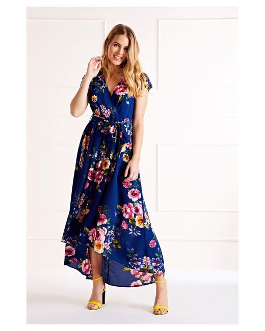 Mela London Blue Floral Wrap Over Dipped Hem Midi Dress