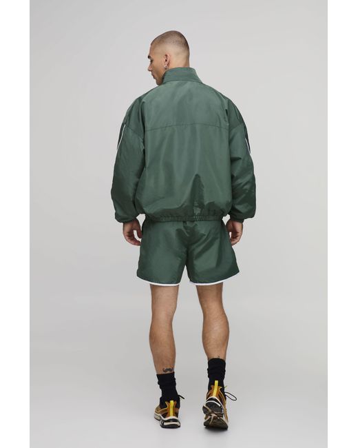 BoohooMAN Green Boxy Shell Seam Embroidered Funnel Dual Zip Short Tracksuit for men