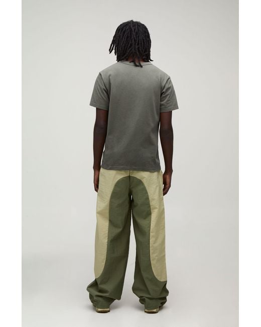 BoohooMAN Green Baggy Fit Panel Detail Track Pants for men