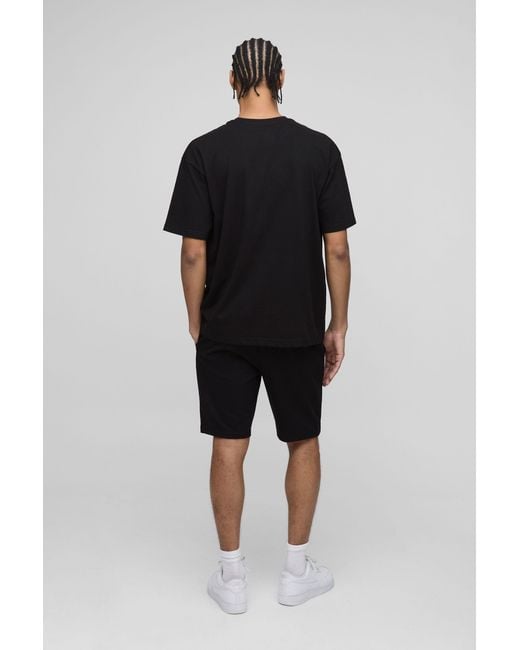 BoohooMAN Black Lightweight Basic Slim Fit Mid Length Shorts for men