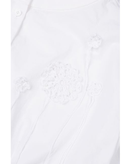 YIBRI White Cropped Blouse With Crochet Flower And Smocked Bell Sleeves