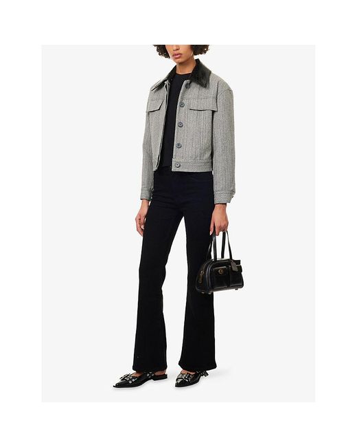 FRAME The Icon Flared Cotton-Blend Jeans in Black | Lyst