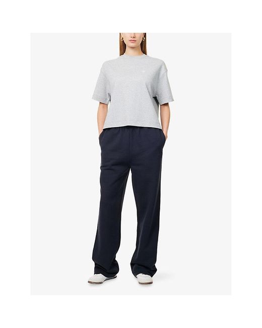 The Couture Club Blue Embossed Emblem Straight-Leg Cotton-Jersey Jogging Bottoms