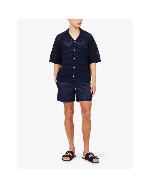 The Couture Club Blue Water Reactive Emblem Swim Shorts for men