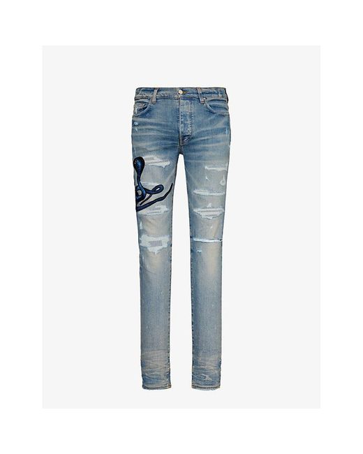 Amiri Blue Clay Snake-Patch Slim-Fit Tapered Stretch-Denim Jeans for men