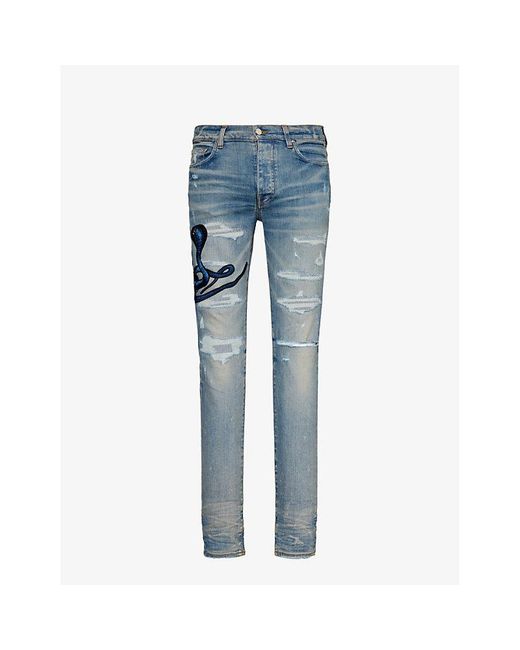 Amiri Blue Snake-patch Slim-fit Tapered Stretch-denim Jeans for men