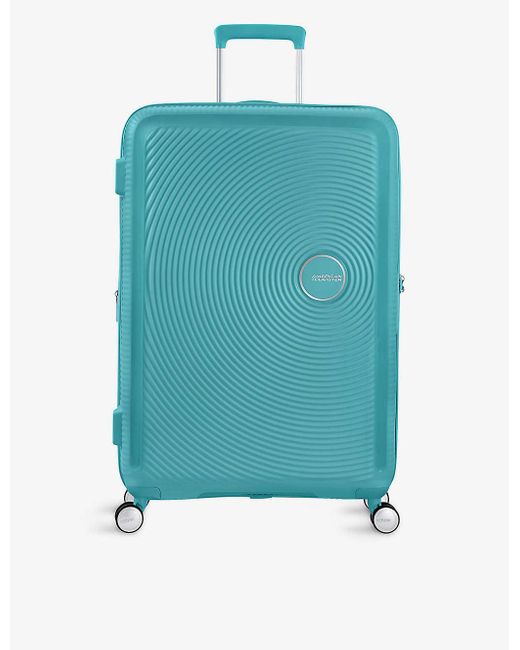 American Tourister Blue Starvibe Expandable Four-wheel Suitcase
