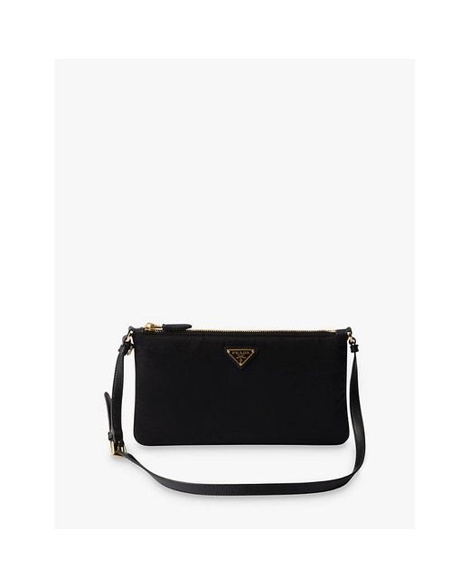 Prada Re Nylon Logo Plaque Recycled Nylon And Leather Pouch in Black Lyst UK