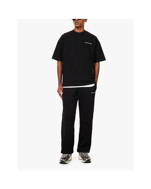 MKI Miyuki-Zoku Blue Uniform Brand-Print Cotton-Blend Jogging Bottoms for men