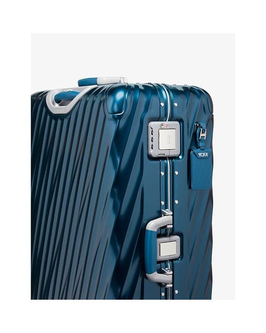 Tumi Extended Trip Expandable Fourwheeled Aluminium Suitcase in Blue