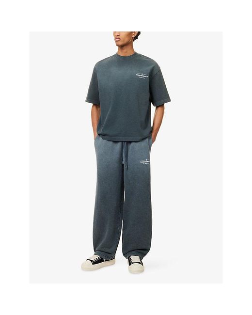 The Couture Club Blue Spray-Wash Logo-Print Cotton Jogging Bottoms for men