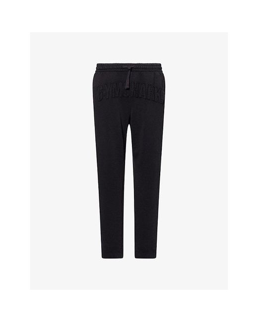 GYMSHARK Black Brand-Patch Tapered-Leg Cotton-Blend Jogging Bottoms for men