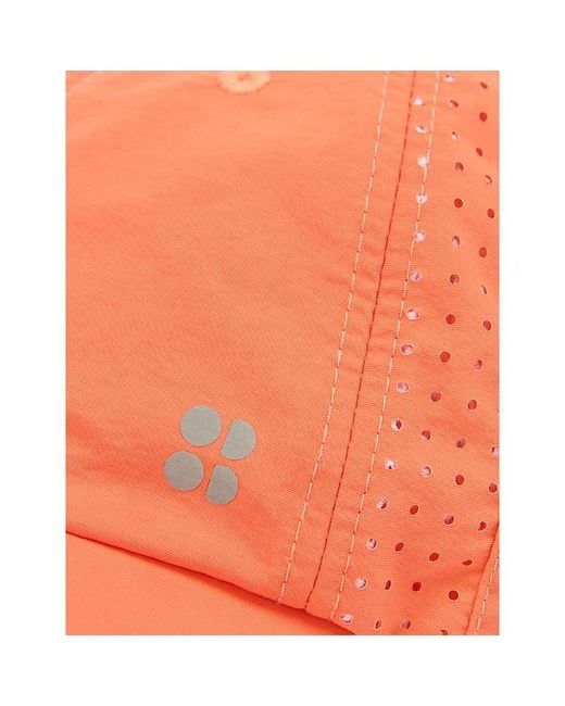 Sweaty Betty Orange Swiftie Pace Nylon Cap