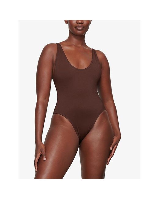 Skims Brown Signature Swim Snake-Print Stretch Recycled-Nylon Swimsuit