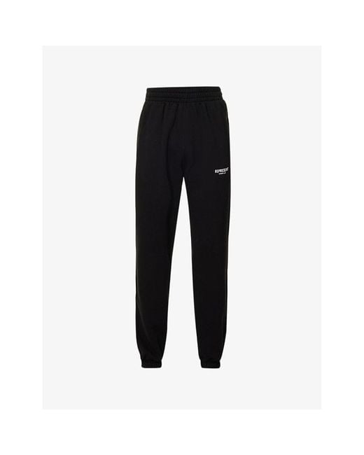 Represent Black Owners' Club Text-Print Relaxed-Fit Cotton-Jersey Jogging Bottoms for men
