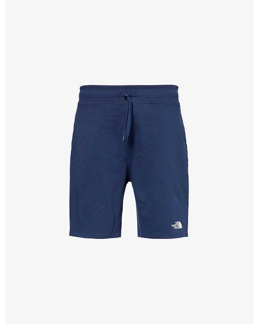 The North Face Blue Standard Branded-print Cotton-jersey Shorts for men