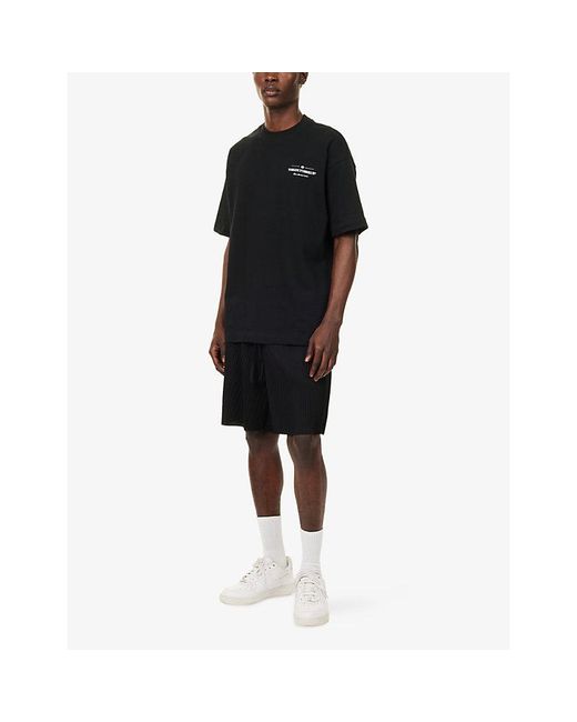 The Couture Club Black Plisse Midi Woven Shorts for men