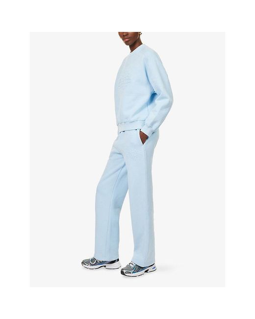 The Couture Club Blue Raised Emblem Wide-Leg Cotton-Jersey Jogging Bottoms