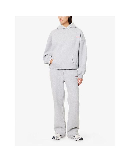 Sisters & Seekers Blue Brand-Print Wide-Leg Cotton-Blend Jogging Bottoms