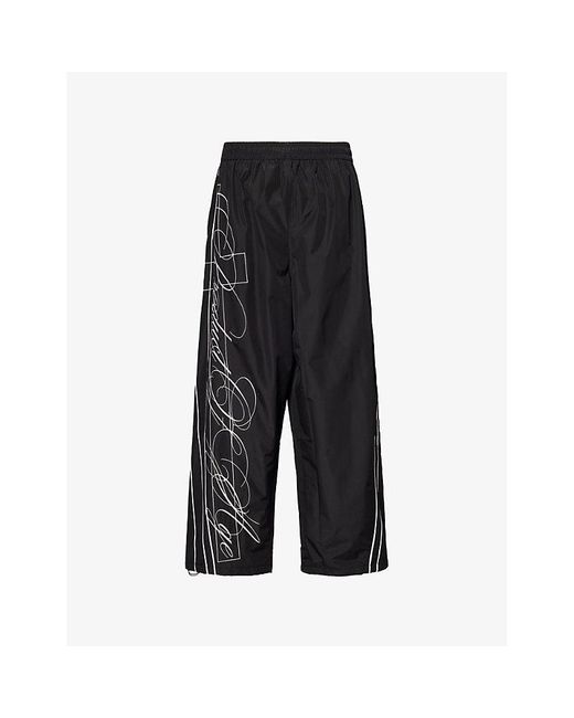 Jaded London Black Product Of Age Vapor Text-Embroidered Shell Tracksuit Bottoms for men
