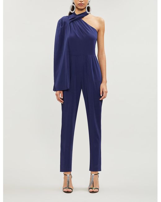 lavish alice one shoulder cape jumpsuit