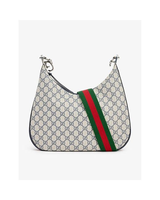 GUCCI Attache large textured leather-trimmed coated-canvas shoulder bag