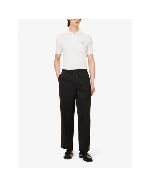 Fred Perry Black Twill-texture Brand-embroidered Relaxed-fit Straight-leg Cotton Trousers for men