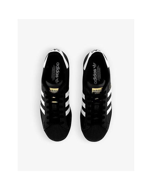 adidas Superstar Logo-embossed Low-top Leather Trainers in Black for Men |  Lyst
