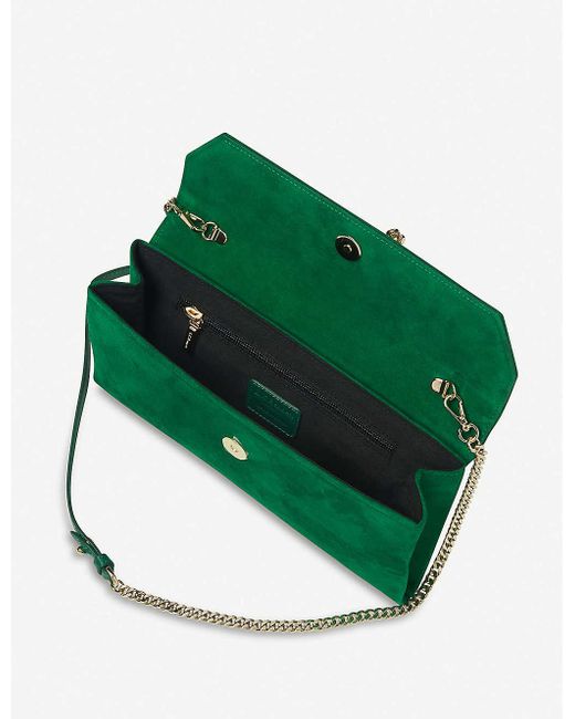 green suede clutch bag