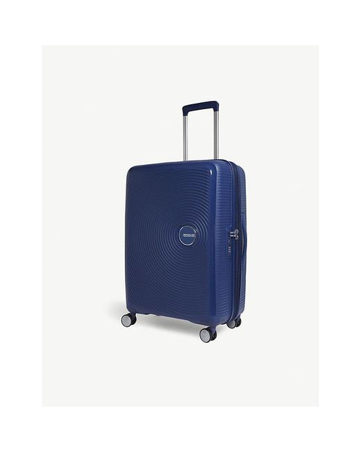 American Tourister Blue Soundbox Expandable Four-wheel Suitcase