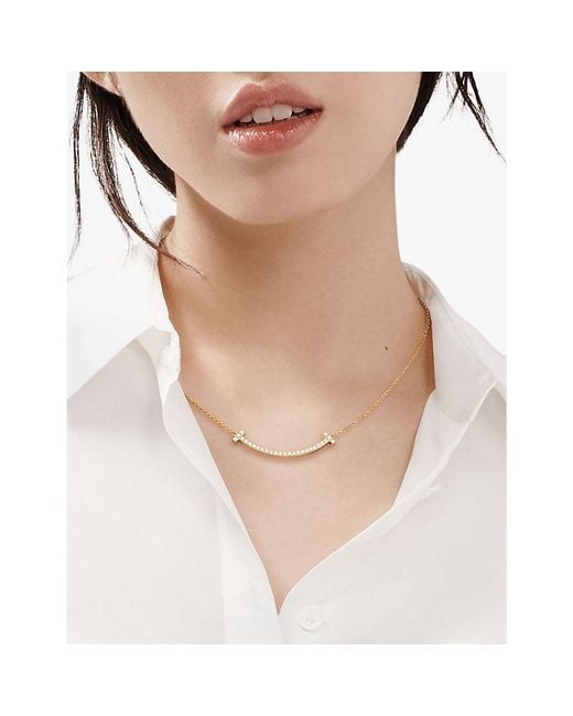 Tiffany & Co Metallic Tiffany T Medium Smile 18Ct- And 0.48Ct Brilliant-Cut Diamond Pendant Necklace