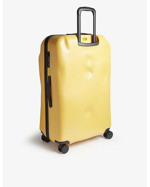 mustard yellow suitcase