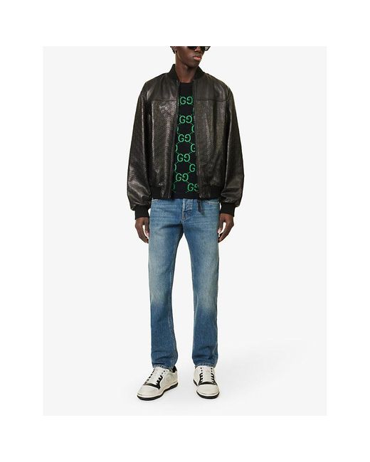 Gucci Blue Brand-patch Faded-wash Mid-rise Tapered-leg Jeans for men